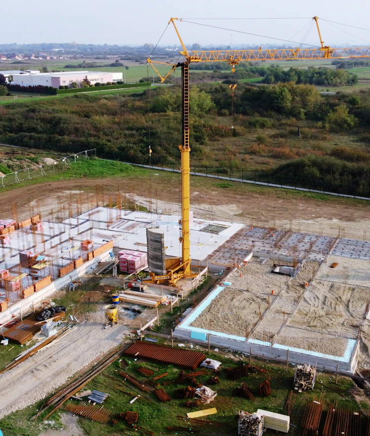 A construction team reviewing plans on site
