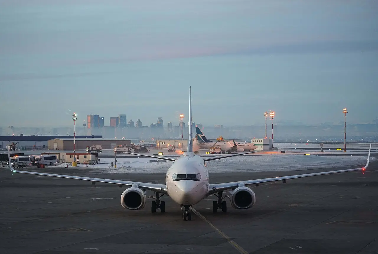 The Calgary skyline with a jet overhead