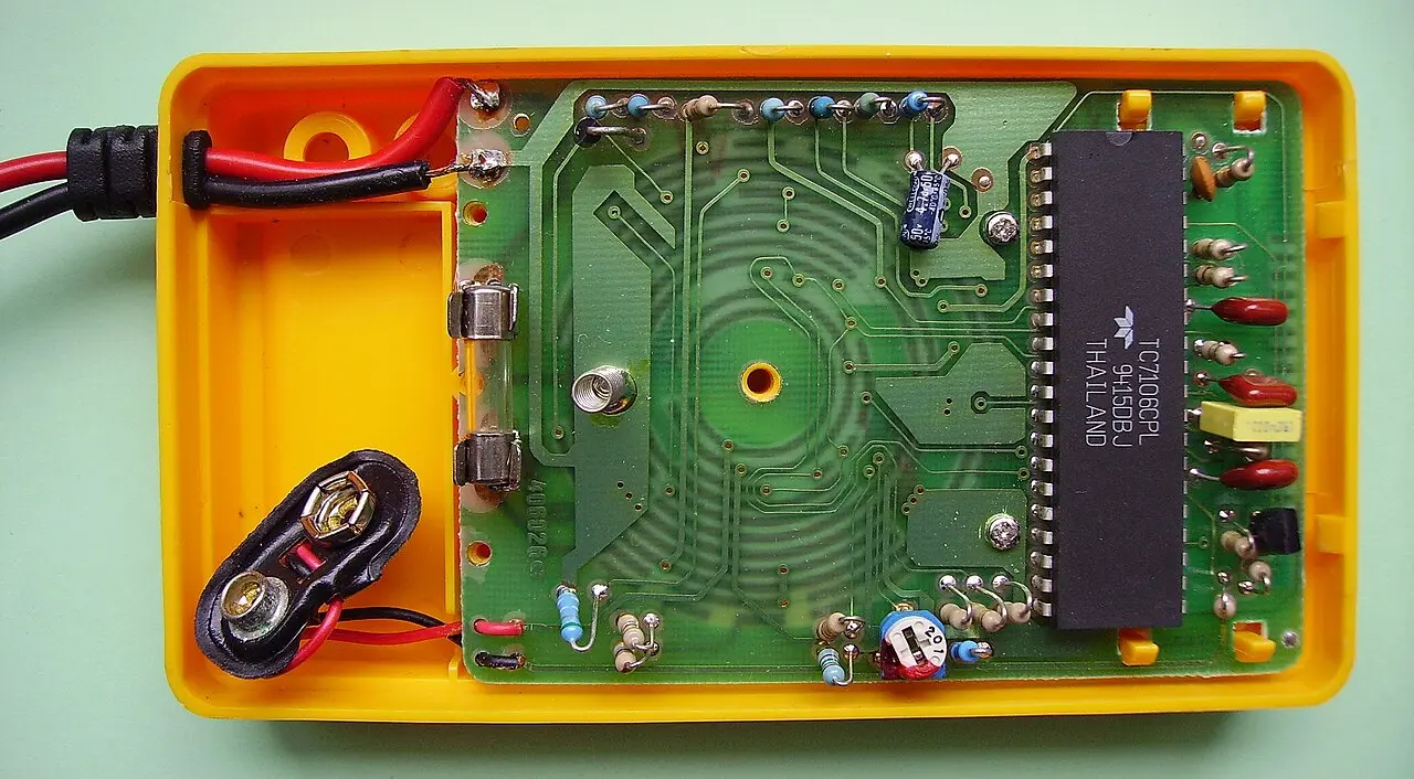 A printed circuit board inside a device enclosure