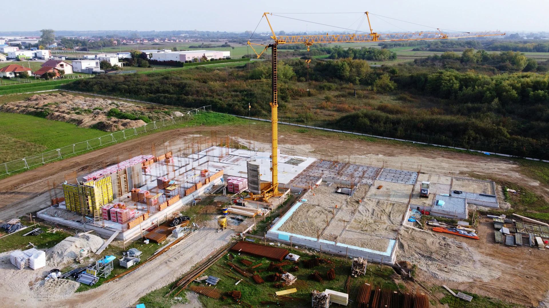 Construction site with crane from above